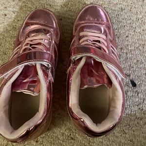 Pink sneakers similar to heelys